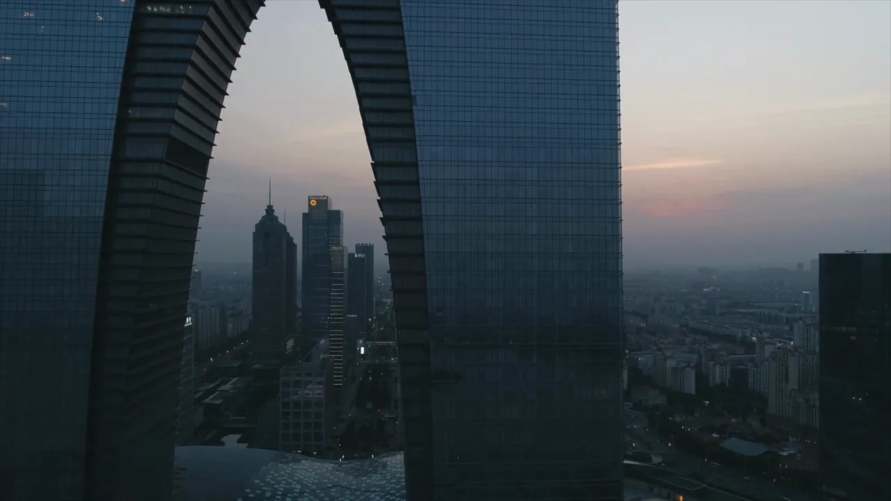 Modern business district skyline in China at sunset