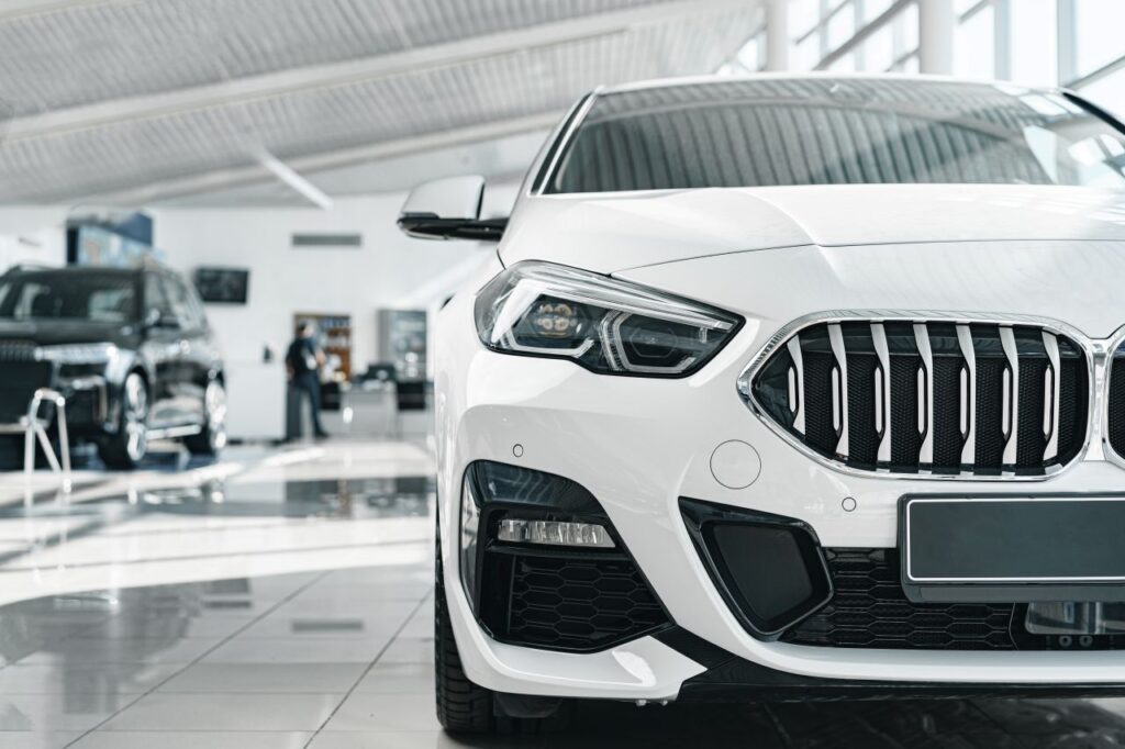 german vehicle interior showroom with man in background s