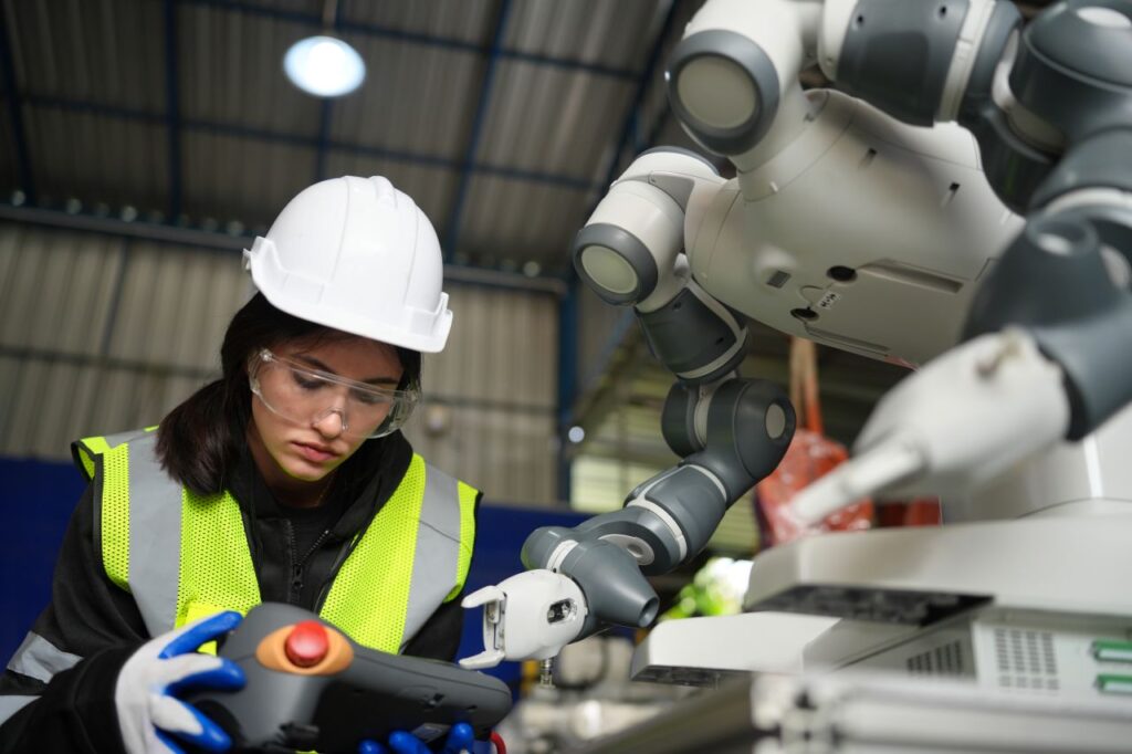 engineer working with robot in factory setting china s