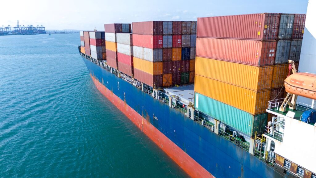 taiwan shipping cargo containers stacked on a commercial ship s