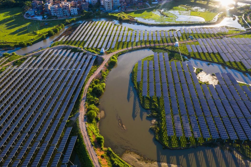 solar panels and river in rural setting china